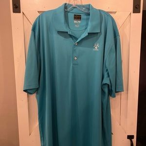 Greg Norman blue golf shirt